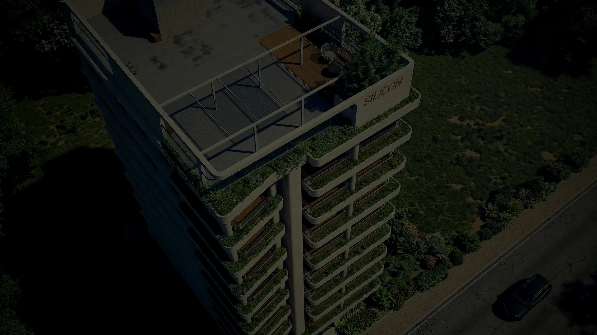 Samtaz from the air, a green, wood-lined residential tower in Jolshiri